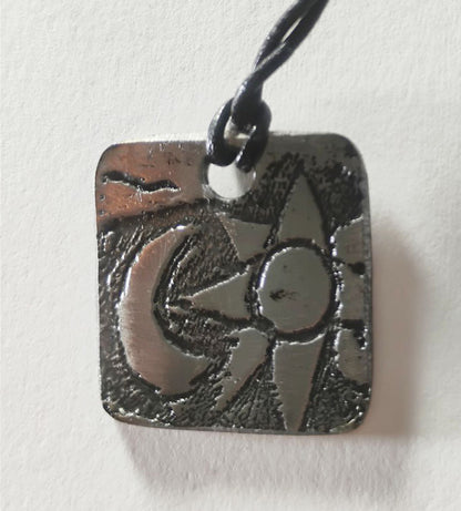 Electro-Etched Metal Amulet